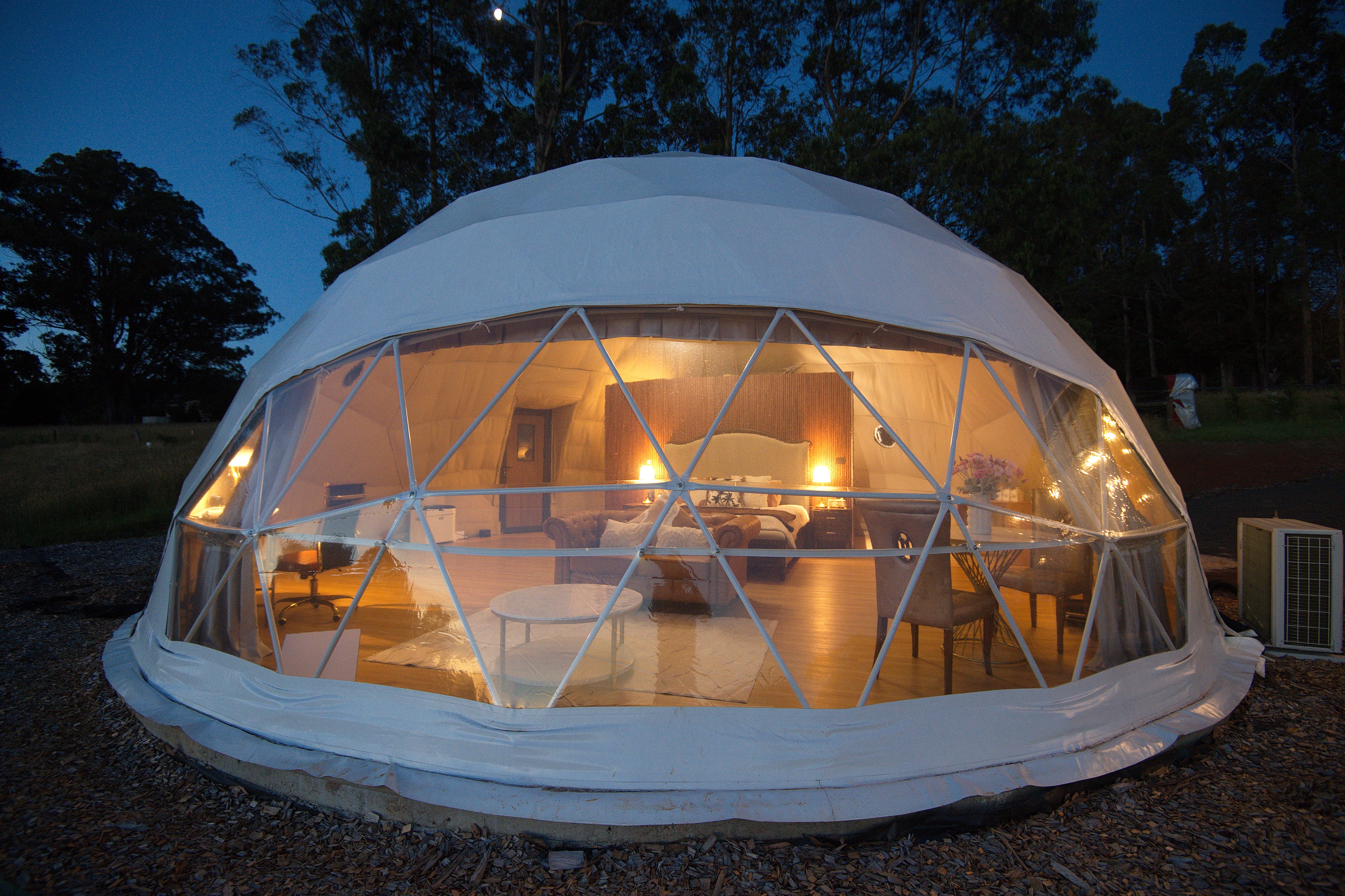 Geodesic dome tent and outdoor pavilion in green Gippsland countryside